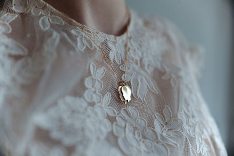 Handmade Jewelry - Woman with golden silhouette pendant made from recycled gold
